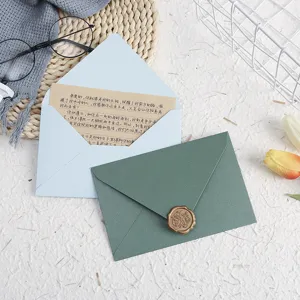 Stationery letter envelope set with wax seal, blue and green envelopes for greeting cards.