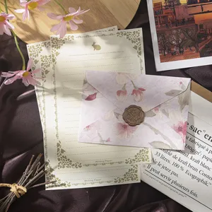 Vintage floral letter paper and envelope set with embossed design, retro stationery for writing.