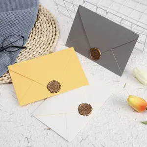 Color pearlescent paper envelopes set with vintage wax seals for greeting cards and letters.