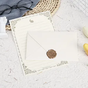 Minimalist stationery letter paper and envelope set with elegant wax seal and cute rabbit design.