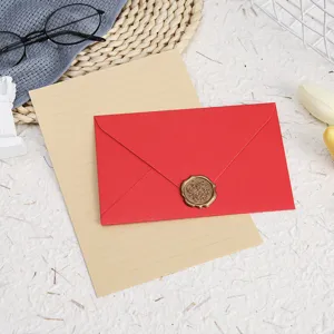 Vintage letter paper and red envelope set with wax seal stamp for greeting cards and love letters.