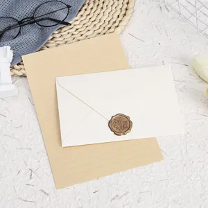 Vintage stationery set with envelope, lined letter paper and wax seal for greeting letters.