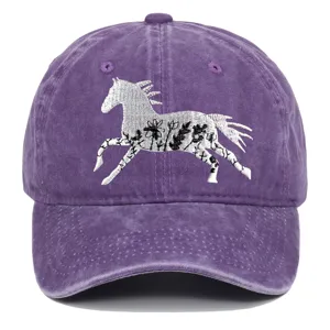 Close-up of purple washed cotton baseball cap with white floral horse embroidery