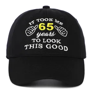 Detailed macro view of 65th birthday gift black cotton embroidered baseball cap.