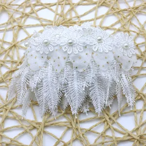 White water-soluble mesh lace trim with pearls and gold dots for clothing sewing and DIY crafts.