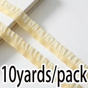 Detailed view of light yellow ruffled elastic trim ribbon, 10 yards pack for sewing DIY craft.