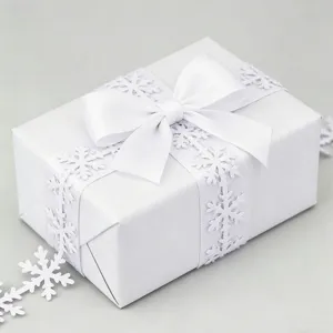 White snowflake ribbon and bow for Christmas gift wrapping, holiday party and floral decor.