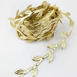 Gold leaf ribbon trim vine for DIY crafts, gift wrapping, and sewing decorations.