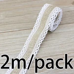 Detailed view of natural burlap ribbon with delicate white lace edge, perfect craft trim.
