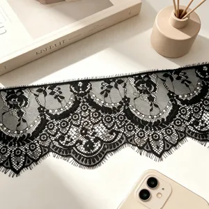 Detailed shot of black eyelash lace trim for DIY sewing, garments and apparel decoration.