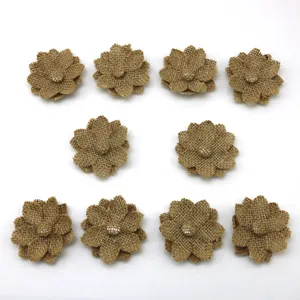 10pcs 6cm jute burlap flowers for vintage DIY craft and rustic clothing decoration.