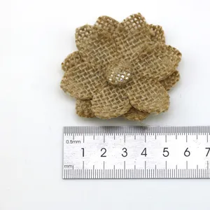 Burlap flower craft detail view, vintage rustic jute floral accessory for DIY decor.