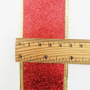 Red glitter ribbon featuring gold wired edges, 5cm width detail for Christmas tree decor.