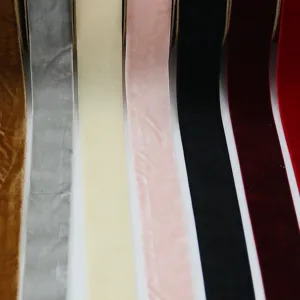 Detailed close-up of colorful velvet ribbons, showing soft texture and vibrant multi-color choices.