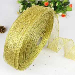 Gold sparkle mesh ribbon spool for gift wrapping, wedding and Christmas decorations.