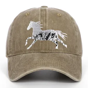 Detail view of white horse floral embroidery on brown washed cotton baseball cap
