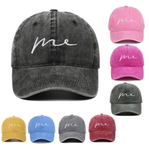 Vintage washed cotton baseball caps in multiple colors featuring 'me' embroidery detail.