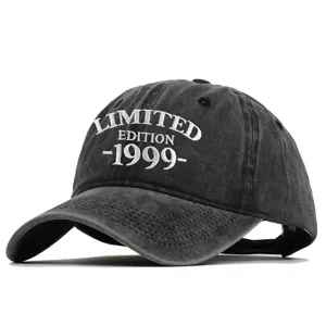 Detailed view of washed charcoal baseball cap with white Limited Edition 1999 embroidery