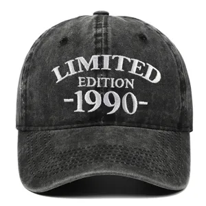 Close-up of vintage washed black baseball cap with 1990 Limited Edition embroidery