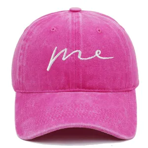Vintage washed pink cotton baseball cap featuring white 'me' script embroidery