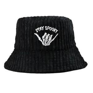 Close-up view of the STAY SPOOKY embroidery on a black ribbed corduroy bucket hat