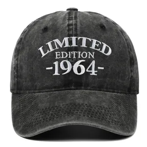 Detailed front view of a vintage washed black denim baseball cap with 1964 embroidery