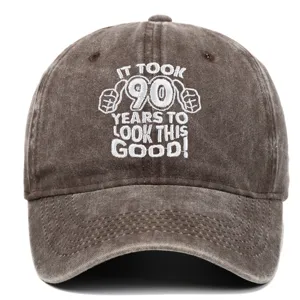 Detail of embroidered 90th birthday washed cotton baseball cap with a vintage distressed finish