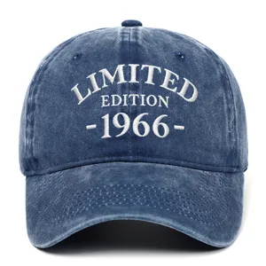 Close-up of 'LIMITED EDITION 1966' white embroidery on washed blue denim baseball cap