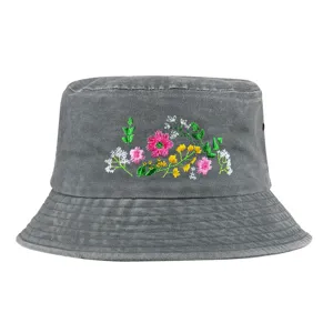Close-up of grey washed bucket hat with colorful floral embroidery detail