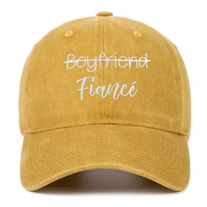 Detail of white Fiancé embroidery on yellow washed cotton baseball cap