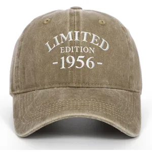 Close-up of premium vintage khaki washed baseball cap with white 1956 embroidery detail