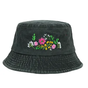 Detailed view of a washed retro bucket hat featuring colorful floral embroidery on cotton