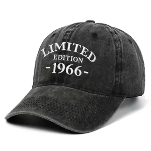 Detailed view of white embroidery on a washed black 1966 limited edition baseball cap