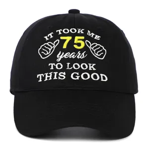 Detailed view of 75th birthday embroidery on a black cotton washed baseball cap