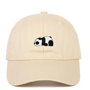 Close-up of beige soft-top baseball cap featuring a cute panda embroidery detail.