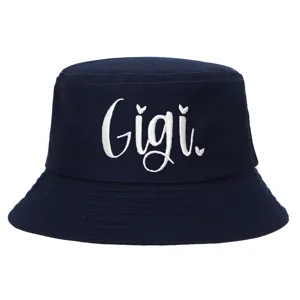 Classic navy blue cotton bucket hat featuring white Gigi embroidery and cute hearts