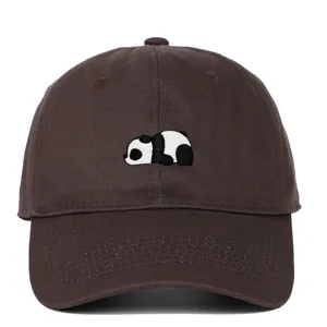 Detailed view of a brown soft top baseball cap featuring a cute embroidered panda design.