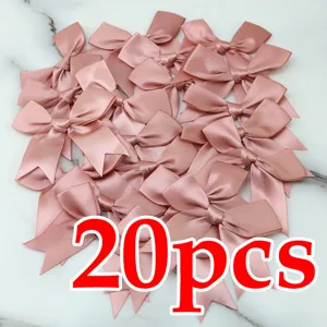 Juego de 20 lazos de cinta de raso rosa, ideales para manualidades DIY.
