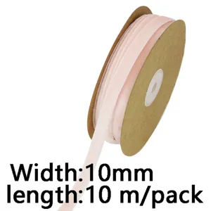 Close-up of light pink velvet ribbon spool detail, 10mm width and 10 meters pack length.