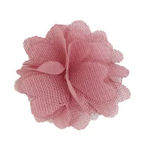 Detailed view of the pink lace chiffon flower accessory, perfect for garment sewing crafts.