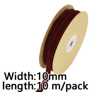 Close-up detail of dark red velvet ribbon on spool, ideal for DIY crafts and gift wrapping.