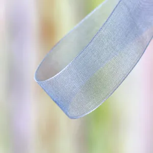 Detail view of light blue sheer organza ribbon, perfect for gift wrapping and floral decoration.