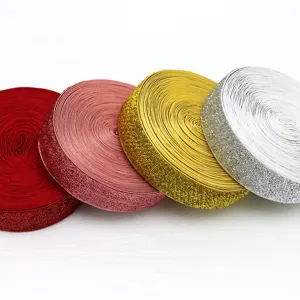 2.5cm glitter elastic ribbon rolls detail shot, perfect for gift packaging and crafts.