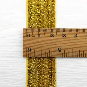 Gold glitter flocked ribbon for gift packaging and bow decoration, 2.5cm width roll.