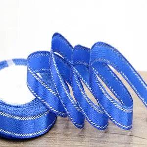 Blue satin ribbon with metallic edge, 6mm width, perfect for gift wrapping and bow making.