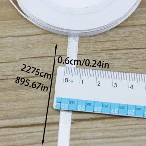 White satin ribbon spool with 6mm width and 22m length, perfect for gift wrapping and crafting.