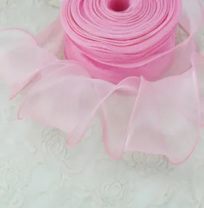 6cm pink organza ribbon with wired edge for flower wrapping gift packaging and crafting.
