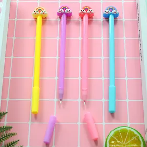 Set of 4 cute cartoon rainbow and cloud gel pens in pastel pink, yellow, blue, and purple