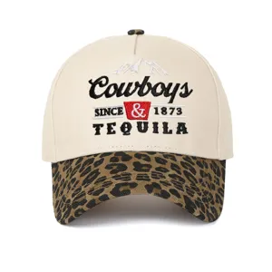 Front detail of embroidered Cowboys and Tequila trucker hat with leopard print brim