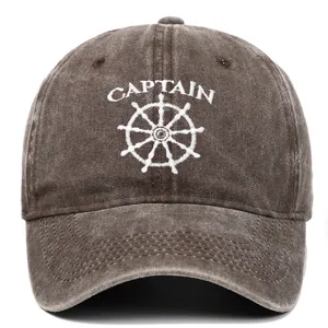 Front view detail of a vintage washed cotton baseball cap with Captain embroidery